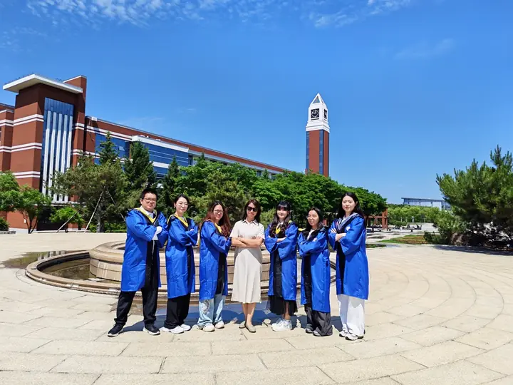Ren Protein Design Group: Graduation by the clock tower